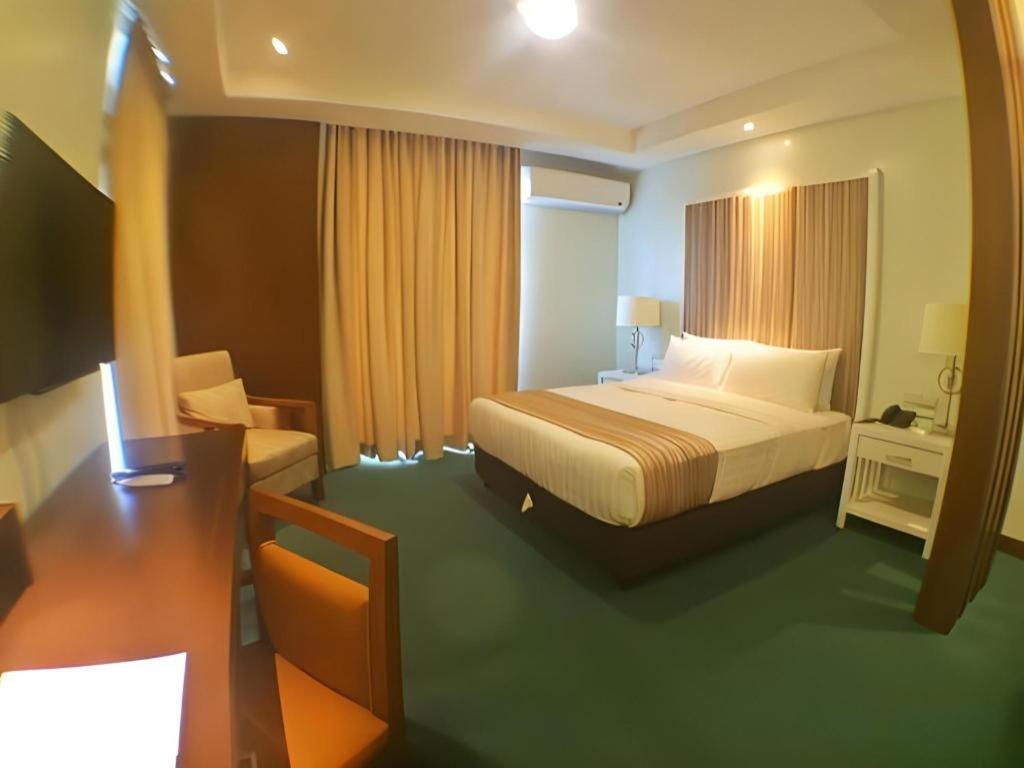 אולונגפו Mansion Garden Hotel מראה חיצוני תמונה