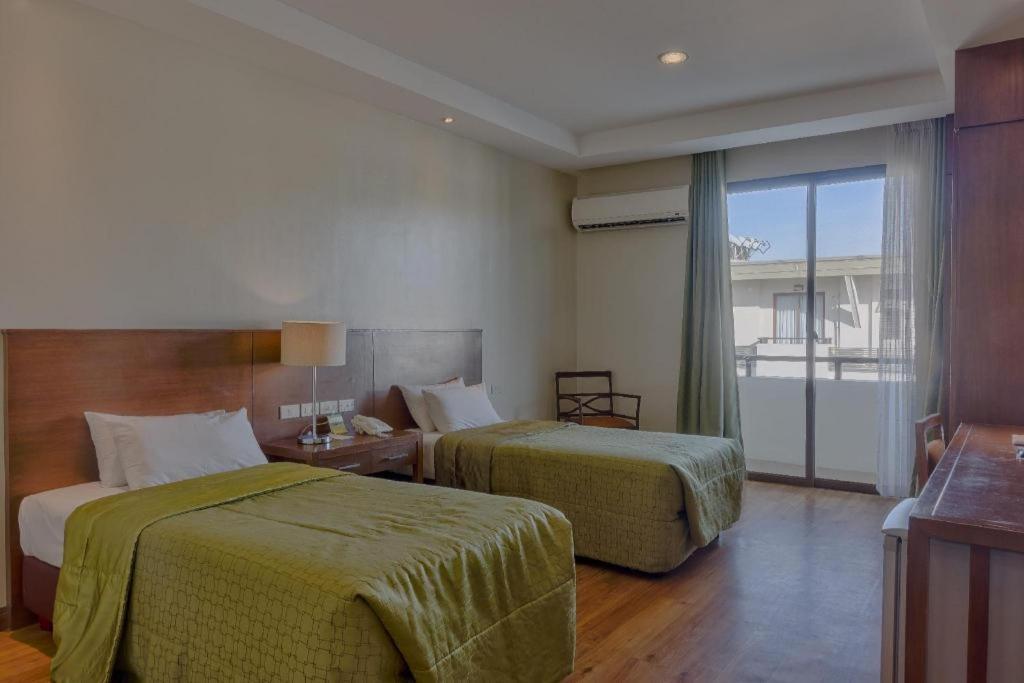 אולונגפו Mansion Garden Hotel מראה חיצוני תמונה